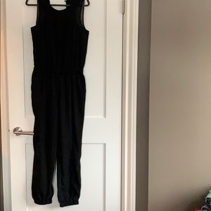 Black sleeveless jumpsuit